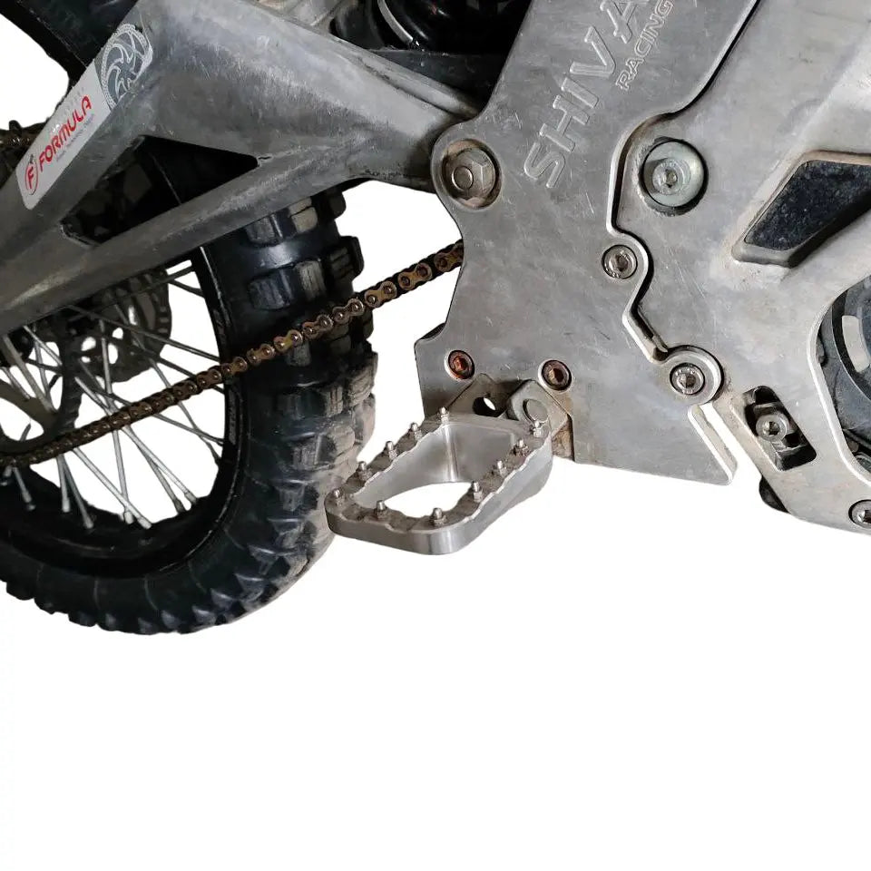 Extended Footpegs for SurRon LBX & Talaria MX SurRonshopsur ron, surron, sur ron x, surron x,  sur ron buy, sur ron bee, sur ron light, sur ron light bee, sur ron x buy, sur ron bee x, sur ron x light, surron buy, sur ron light bee x, surron bee, surron price, e bike sur ron, surron frame, sur ron frame