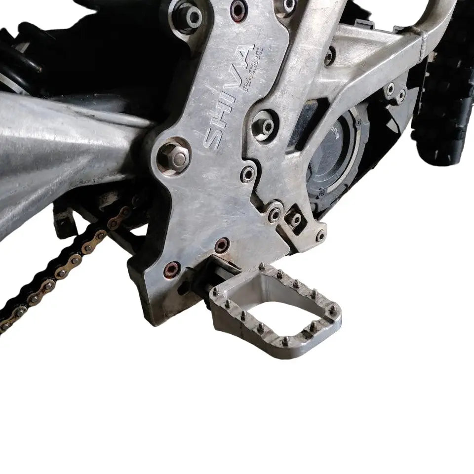 Extended Footpegs for SurRon LBX & Talaria MX SurRonshopsur ron, surron, sur ron x, surron x,  sur ron buy, sur ron bee, sur ron light, sur ron light bee, sur ron x buy, sur ron bee x, sur ron x light, surron buy, sur ron light bee x, surron bee, surron price, e bike sur ron, surron frame, sur ron frame