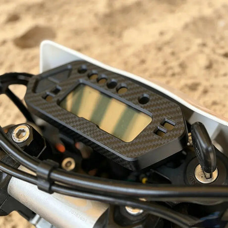Ultra Bee Carbon Fiber Display Cover SurRonshopsur ron, surron, sur ron x, surron x,  sur ron buy, sur ron bee, sur ron light, sur ron light bee, sur ron x buy, sur ron bee x, sur ron x light, surron buy, sur ron light bee x, surron bee, surron price, e bike sur ron, surron frame, sur ron frame