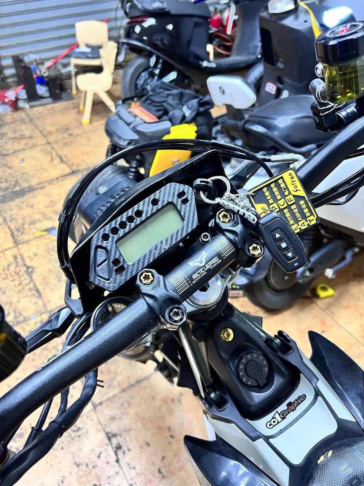 Ultra Bee Carbon Fiber Display Cover SurRonshopsur ron, surron, sur ron x, surron x,  sur ron buy, sur ron bee, sur ron light, sur ron light bee, sur ron x buy, sur ron bee x, sur ron x light, surron buy, sur ron light bee x, surron bee, surron price, e bike sur ron, surron frame, sur ron frame