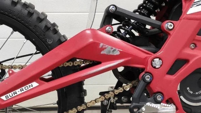 Frame / swing-arm protection covers SurRonshop