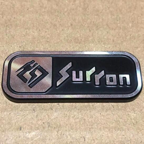 Sur-Ron Battery Lid Logo Plate SurRonshopsur ron, surron, sur ron x, surron x,  sur ron buy, sur ron bee, sur ron light, sur ron light bee, sur ron x buy, sur ron bee x, sur ron x light, surron buy, sur ron light bee x, surron bee, surron price, e bike sur ron, surron frame, sur ron frame